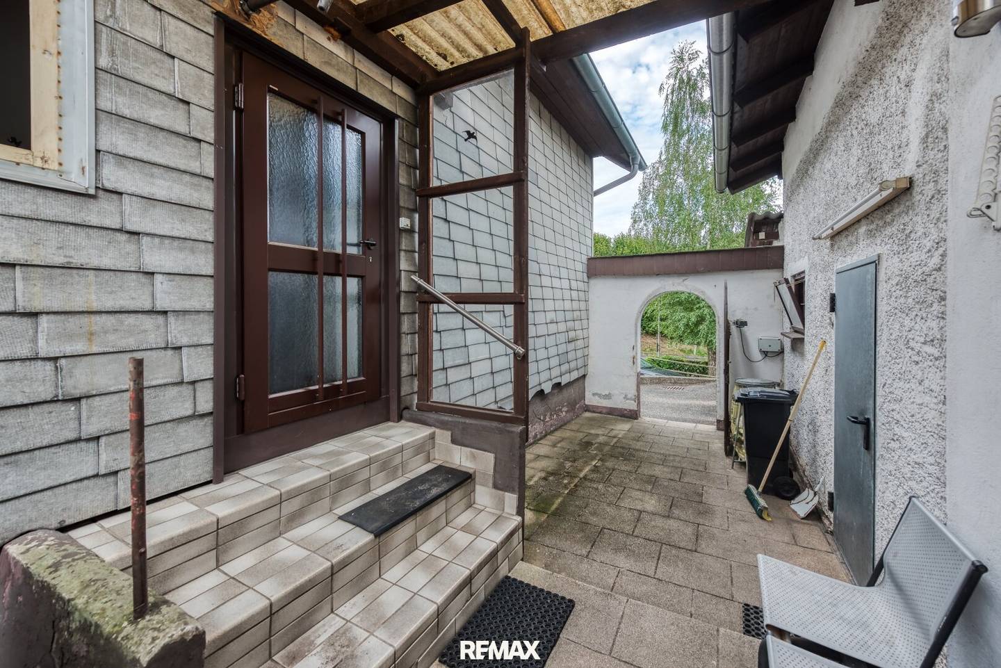 Einfamilienhaus mit Anbau, Garage und großen Garten in Ungenach