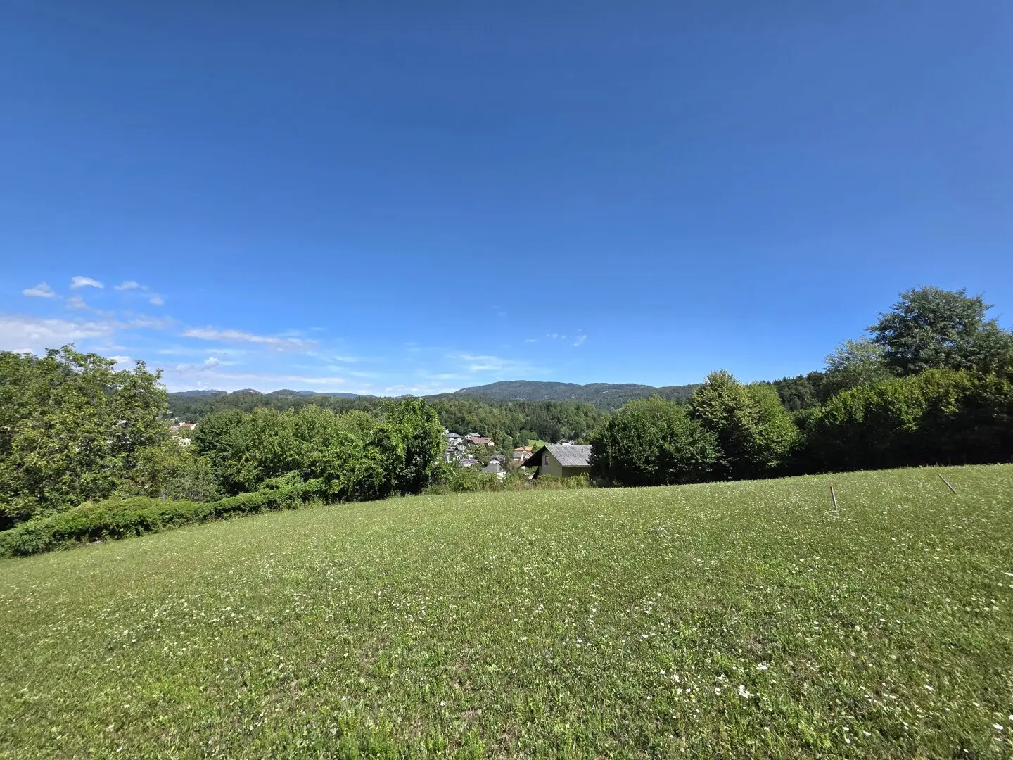 Sunny building plot with magnificent view and lots of potential