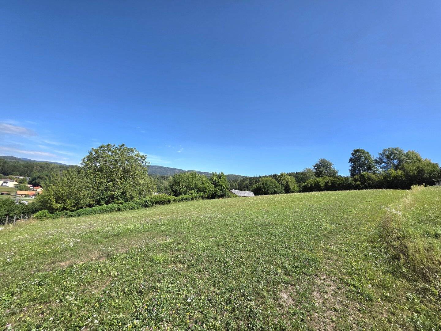 Sunny building plot with magnificent view and lots of potential
