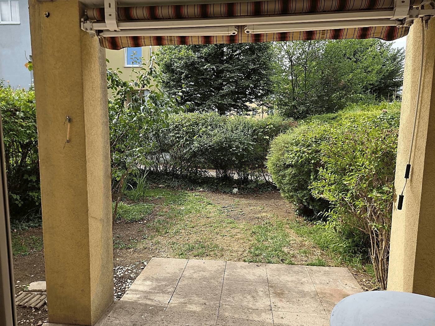 Ground floor apartment with private garden and underground parking space