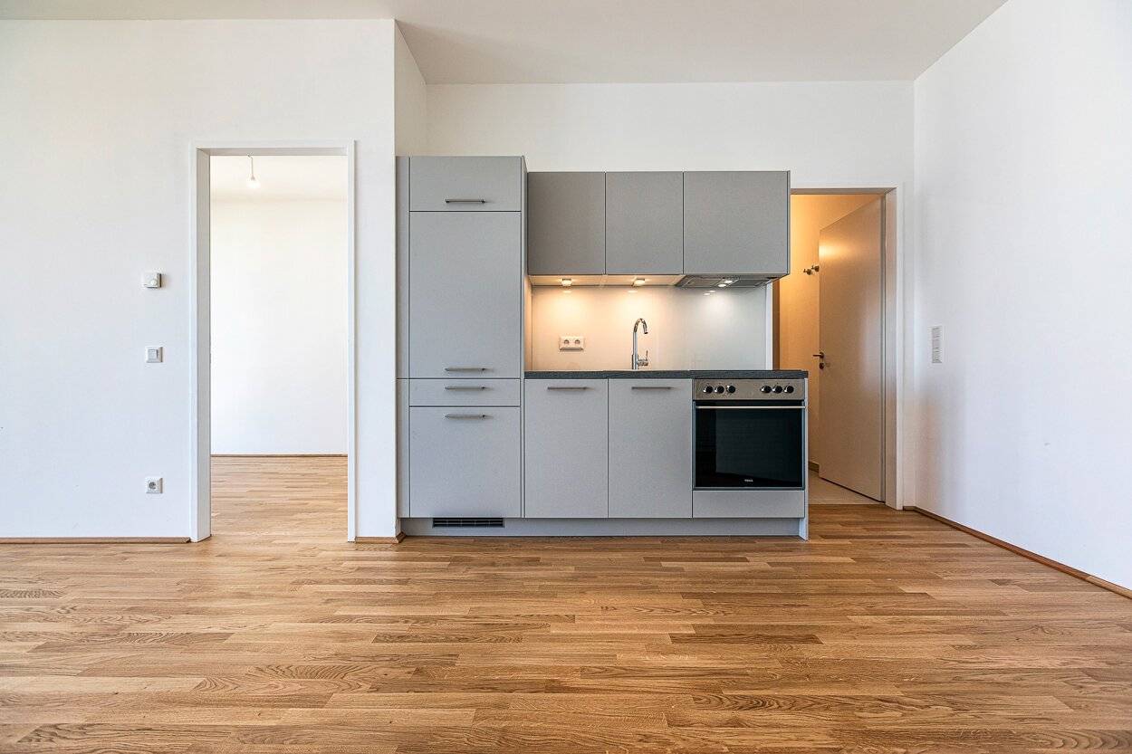 ADELE - 2-Zimmerwohnung mit Balkon + hauseigenem Fitnessstudio, Pool &amp; Gemeinschaftsdachterrasse!