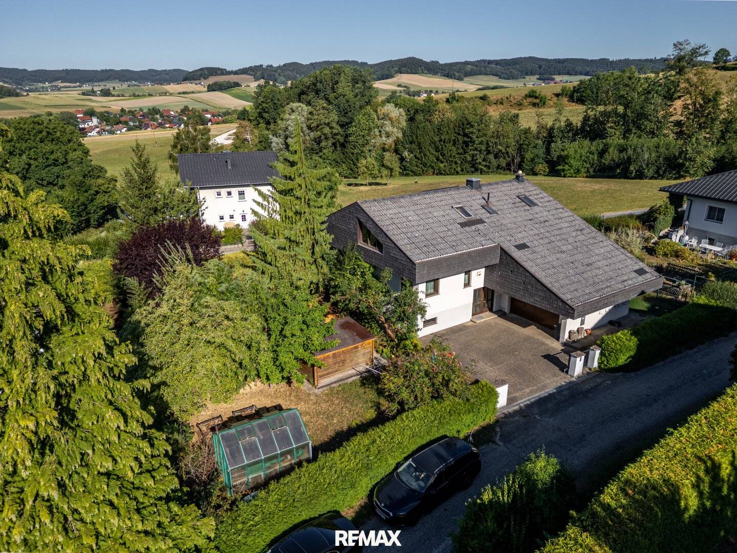 Einfamilienhaus mit Schwimmteich und Garten in Wolfsegg am Hausruck