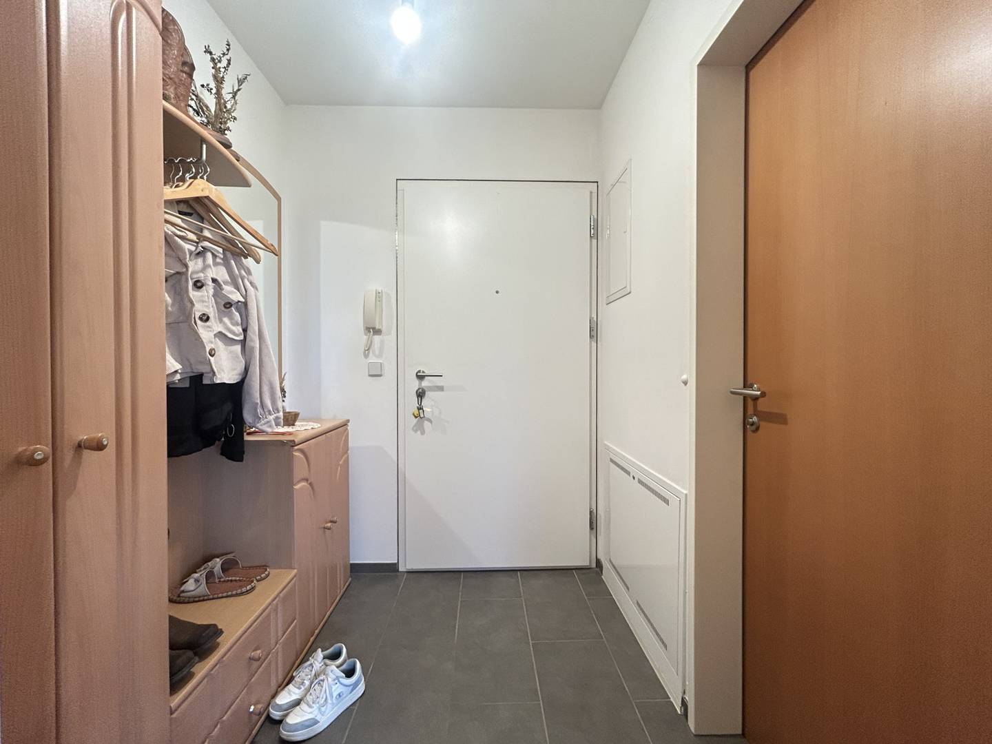 Bright apartment with spacious balcony and carport