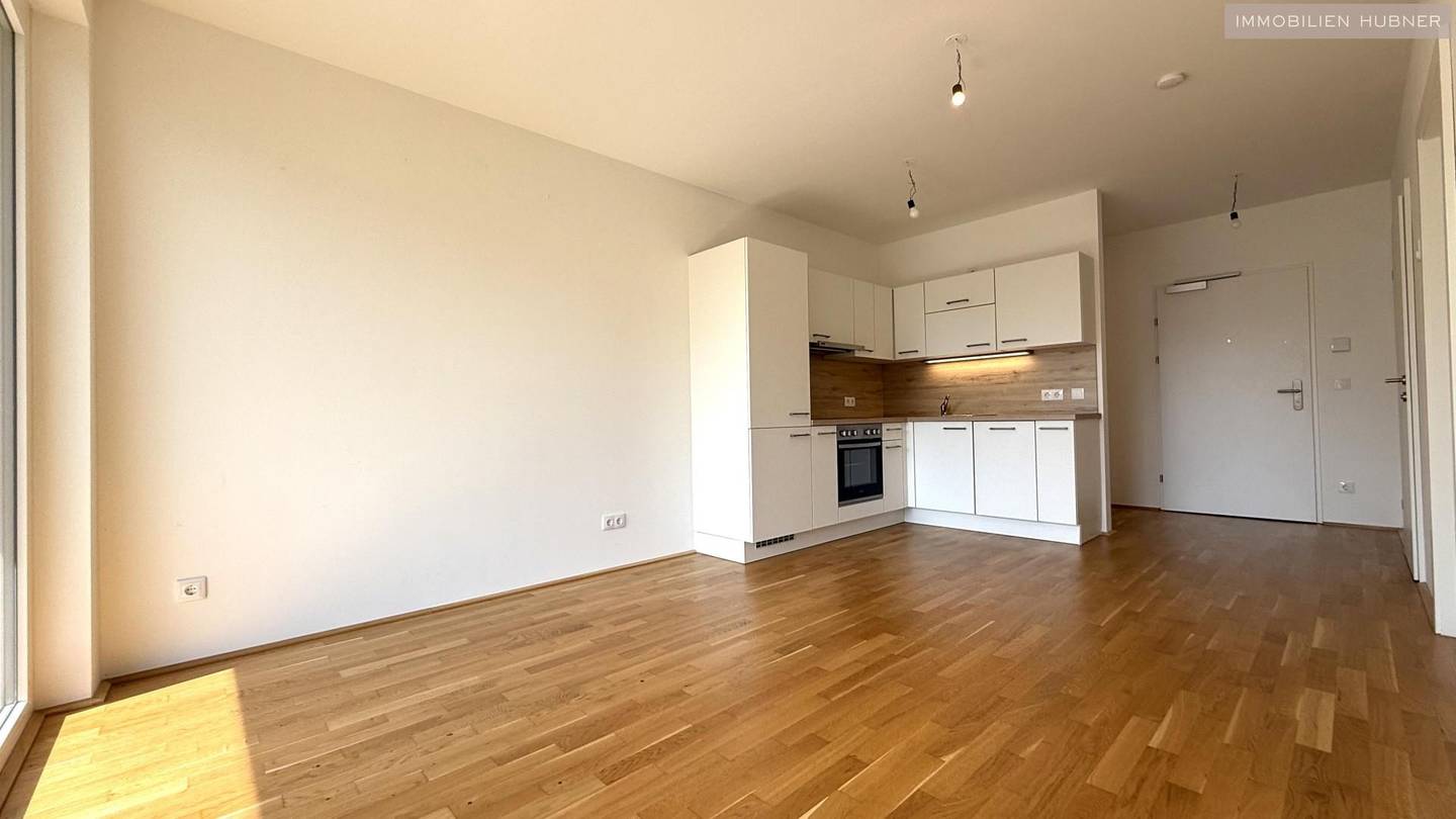 Helle Neubauwohnung mit Ostloggia nahe Akademiepark