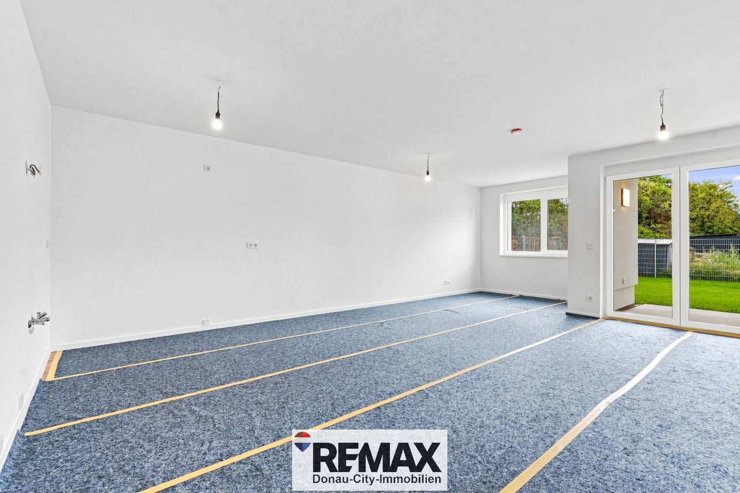 Erdgeschosswohnung mit Privatgarten und energieeffizientem Neubau
