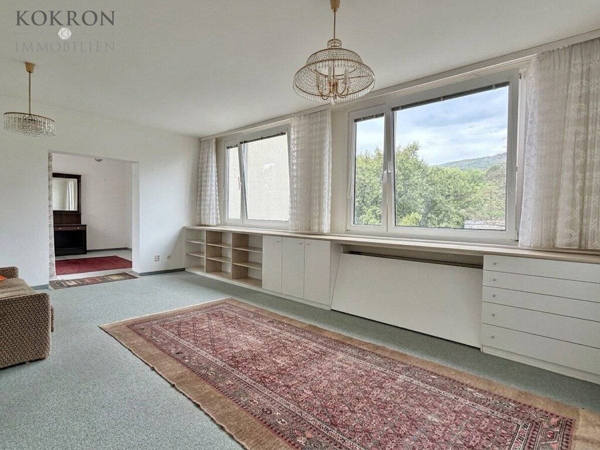 Act now: quiet 4-room apartment with garage and green view at top price