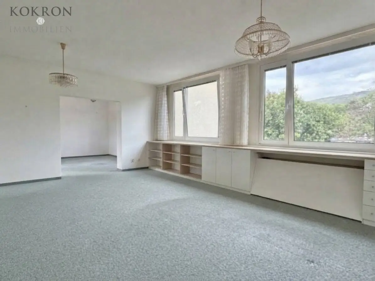 Act now: quiet 4-room apartment with garage and green view at top price