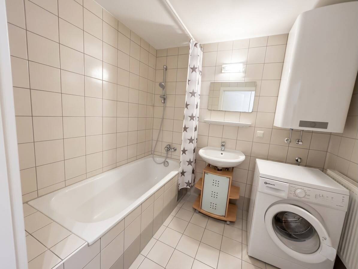 Central Graz city centre location: Secure yield from the first day, rented 2-room apartment with balcony and fully equipped kitchen