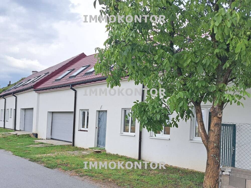 DOPPELHAUSHÄLFTE - eine WOHNUNG mit Innenhofterrasse