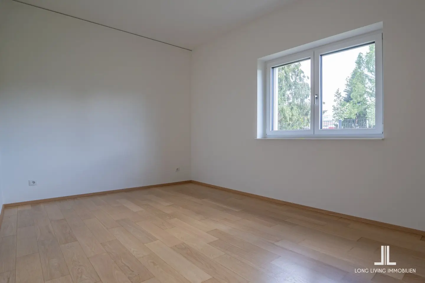 Modern and central living – 3-room ground floor apartment with west terrace, underground parking space and communal rooftop terrace