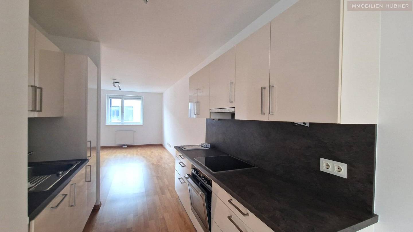 Neuwertige Wohnung mit Fitnessstudio und südseitiger Loggia