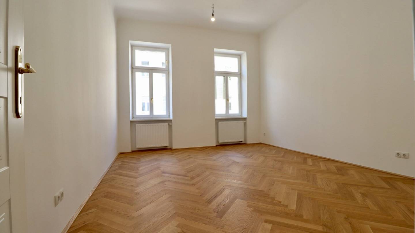 Bright, high, freshly renovated old building charm with first-occupancy quality