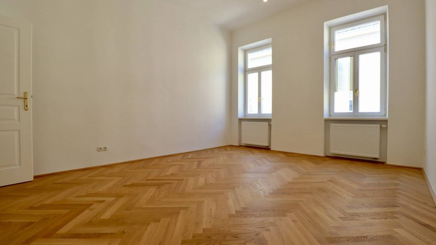 Bright, high, freshly renovated old building charm with first-occupancy quality