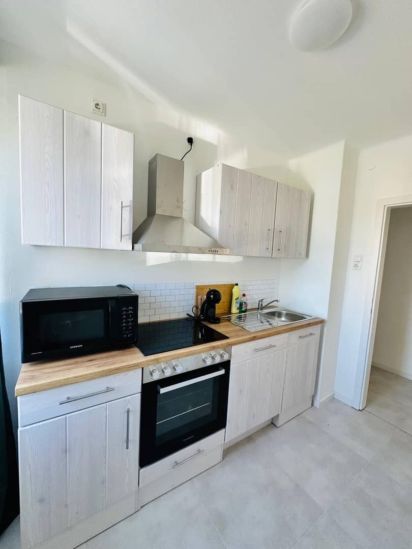 Hochwertig sanierte Wohnung mit Balkon und Gartennutzung