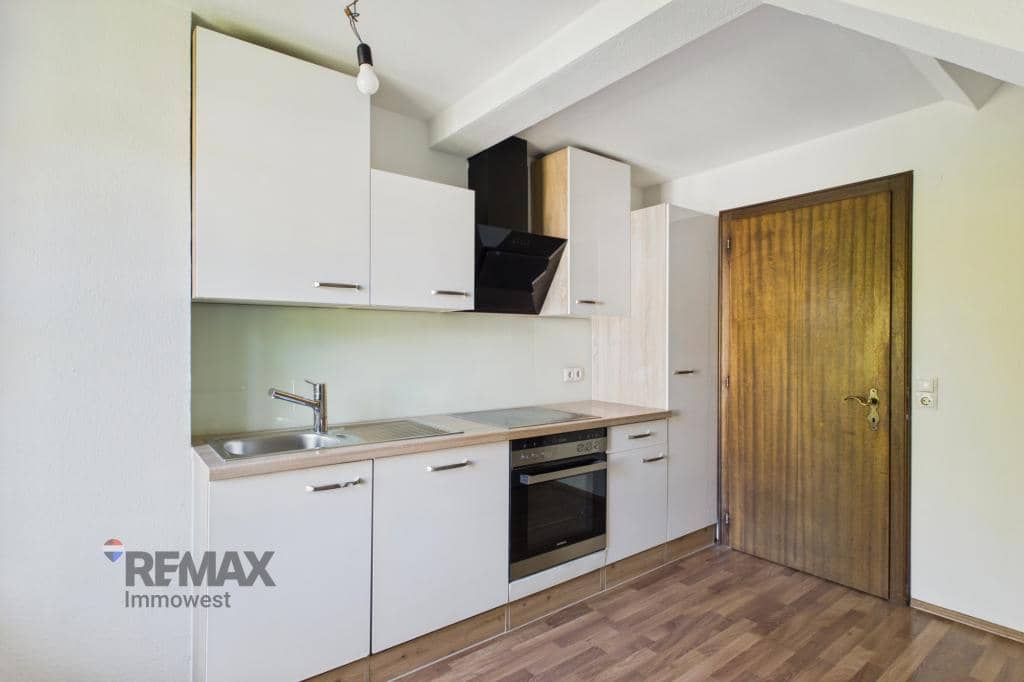 Dachgeschosswohnung mit Altbauflair und privatem Stellplatz