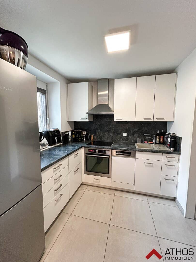 Moderne 2-Zimmer-Wohnung mit Balkon und Garten