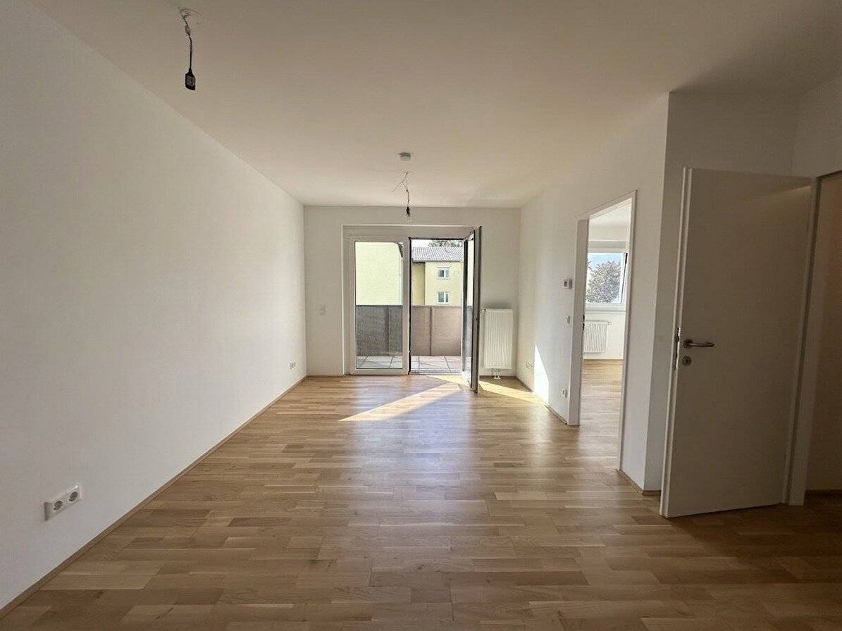 Moderne 2-Zimmer-Wohnung mit Freifläche im Herzfelderhof
