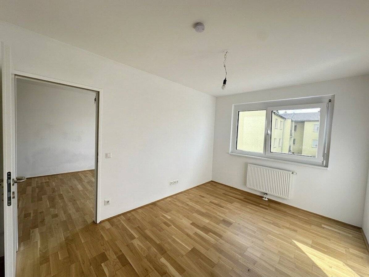 Moderne 2-Zimmer-Wohnung mit Freifläche im Herzfelderhof