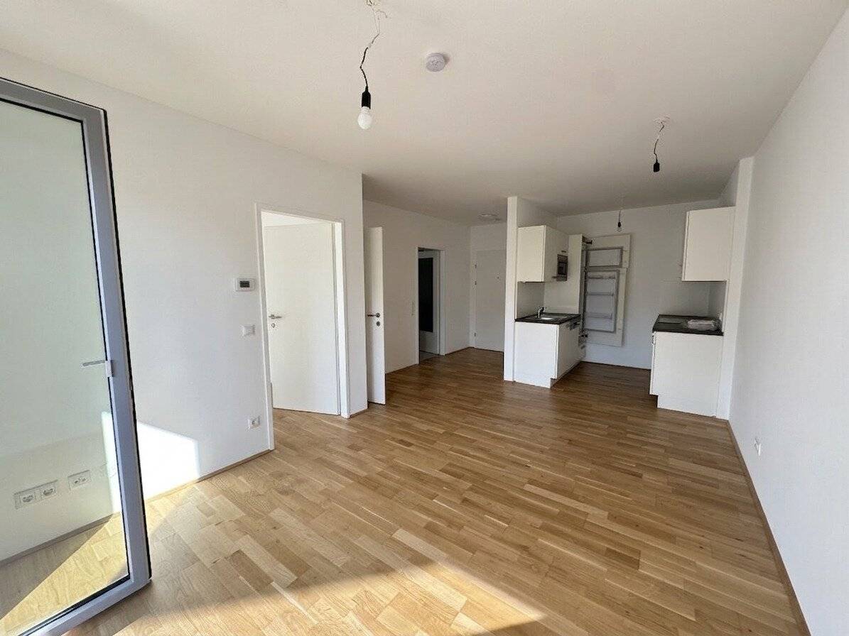 Moderne 2-Zimmer-Wohnung mit Freifläche im Herzfelderhof