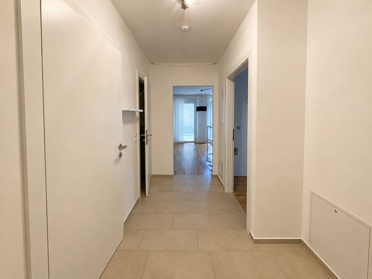 Neuwertige Erdgeschosswohnung mit Privatgarten und Terrasse