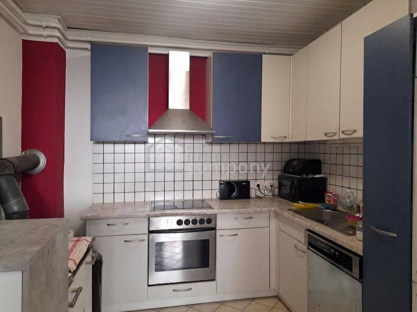House with Potential and Private Courtyard in the Town Centre of Gols