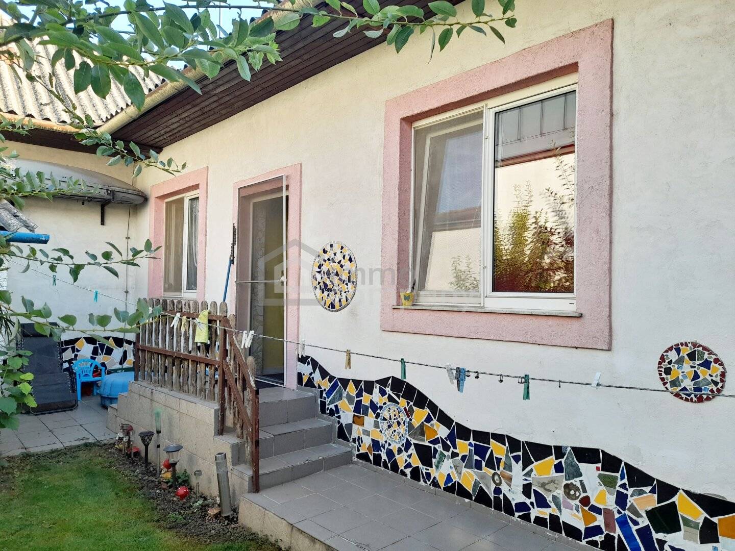 House with Potential and Private Courtyard in the Town Centre of Gols
