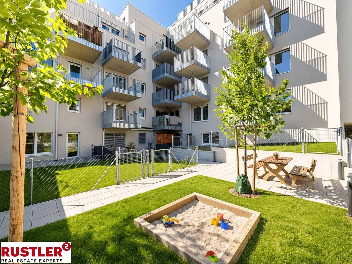 New build apartment in green setting with balcony