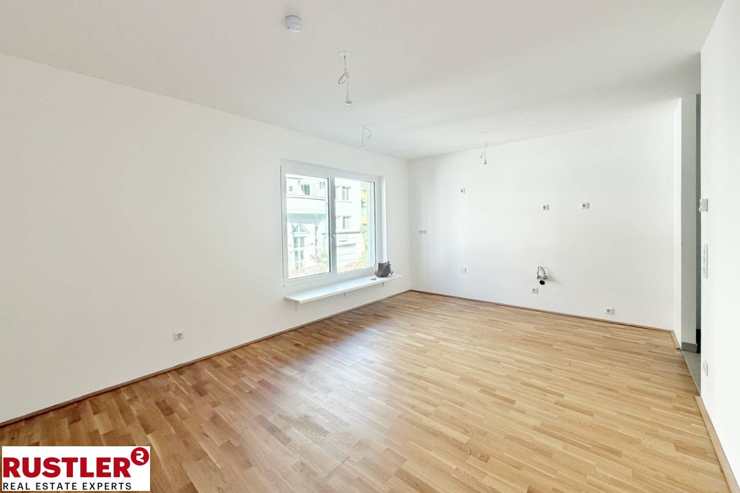Neubauwohnung in ruhiger Grünlage mit Balkon