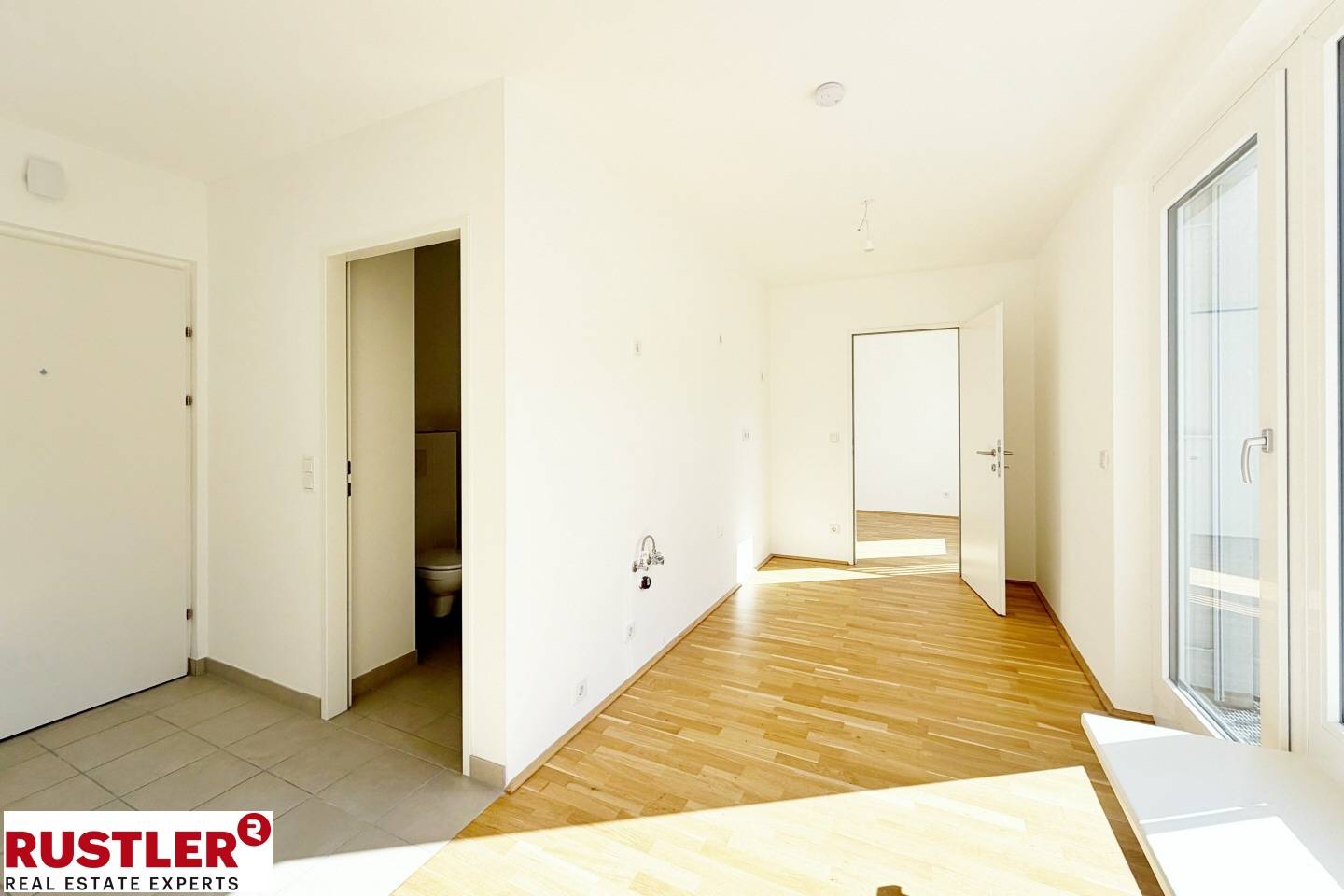 Neubauwohnung mit sonniger Terrasse in Grünlage