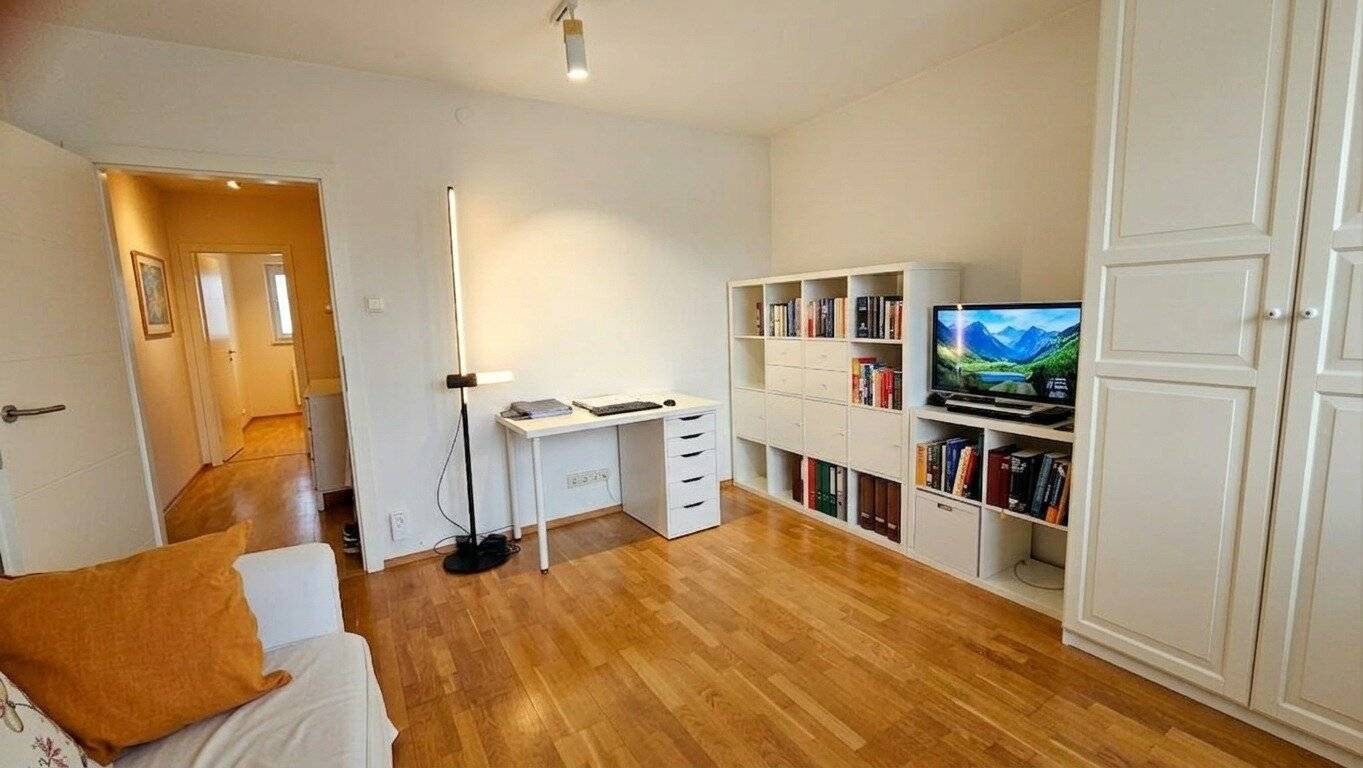 Bright top floor apartment with distant view