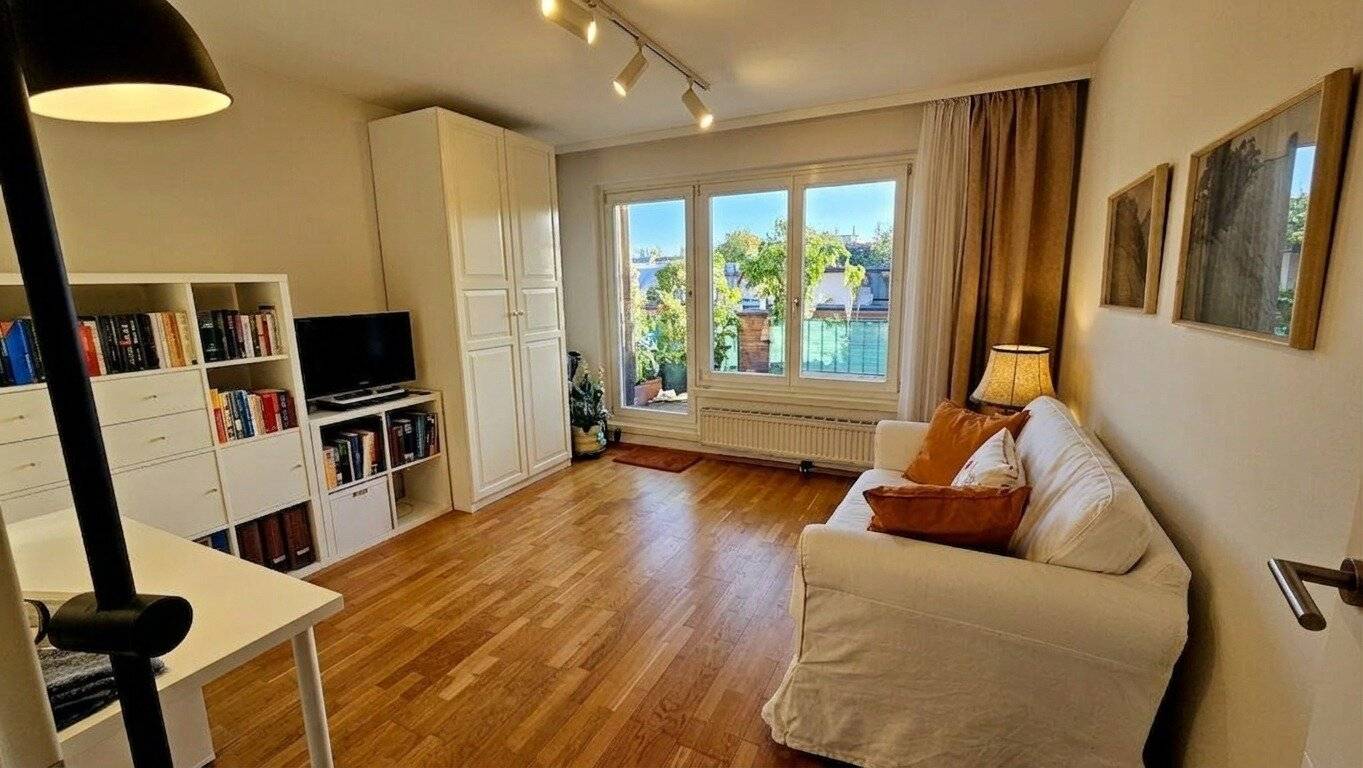 Bright top floor apartment with distant view
