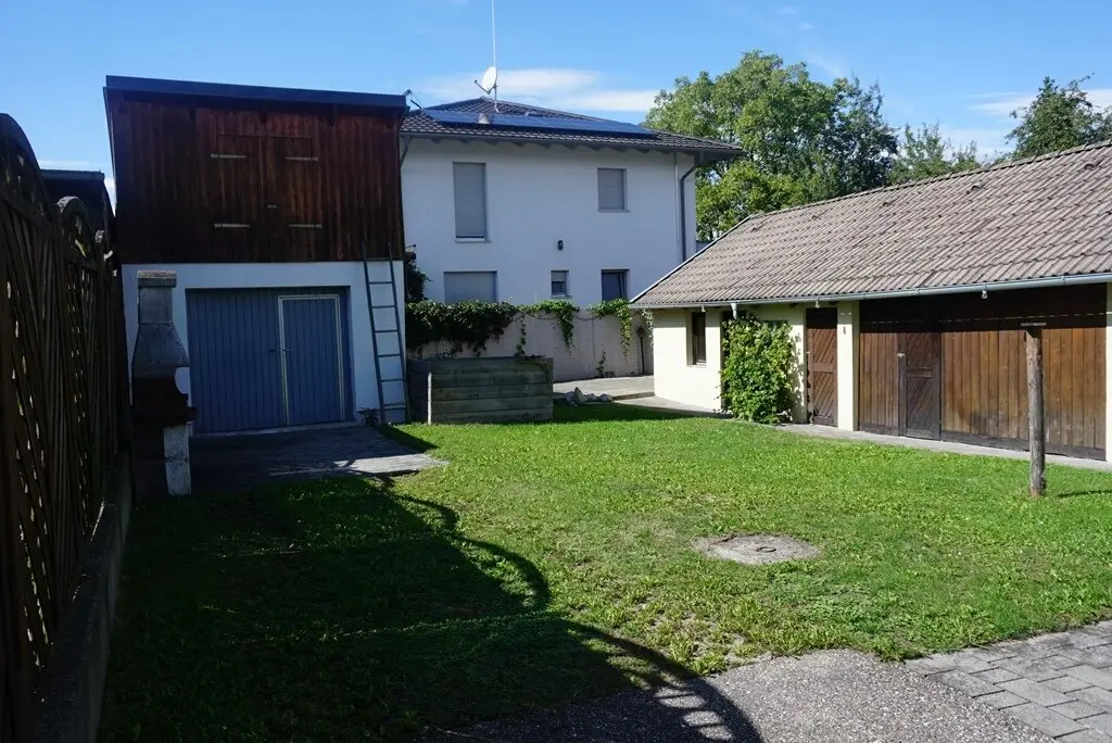 Coming soon: well-maintained two-family house with outbuilding and garage
