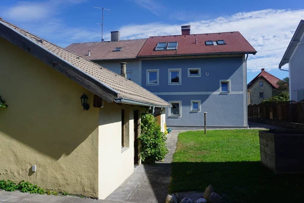 Coming soon: well-maintained two-family house with outbuilding and garage