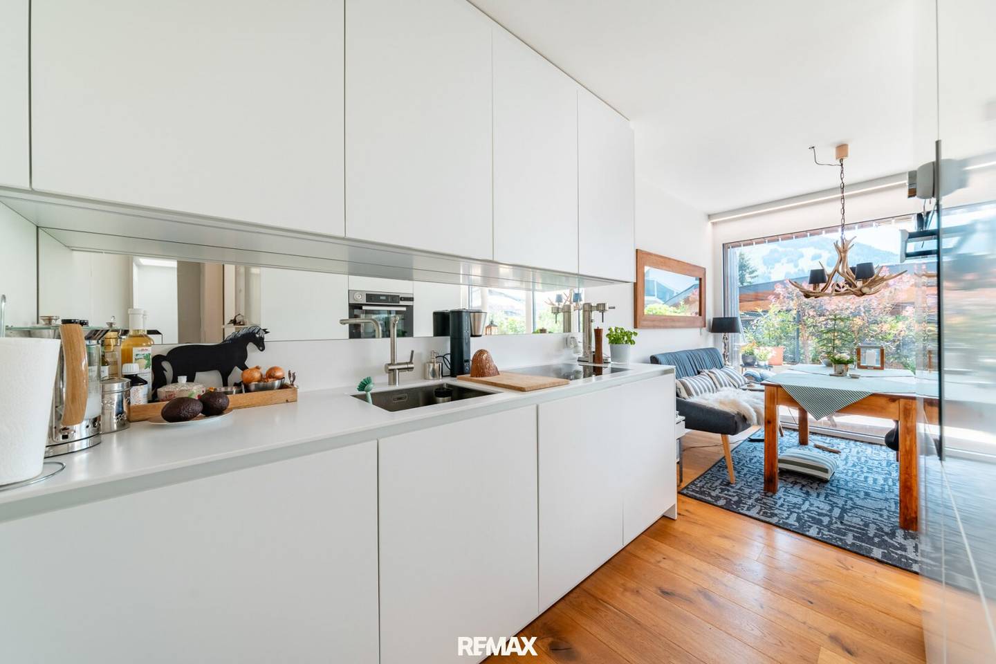 Modernes Wohnen mit Bergblick &amp; Sonnenterrasse – Hochwertige 2-Zimmer Gartenwohnung in Kössen