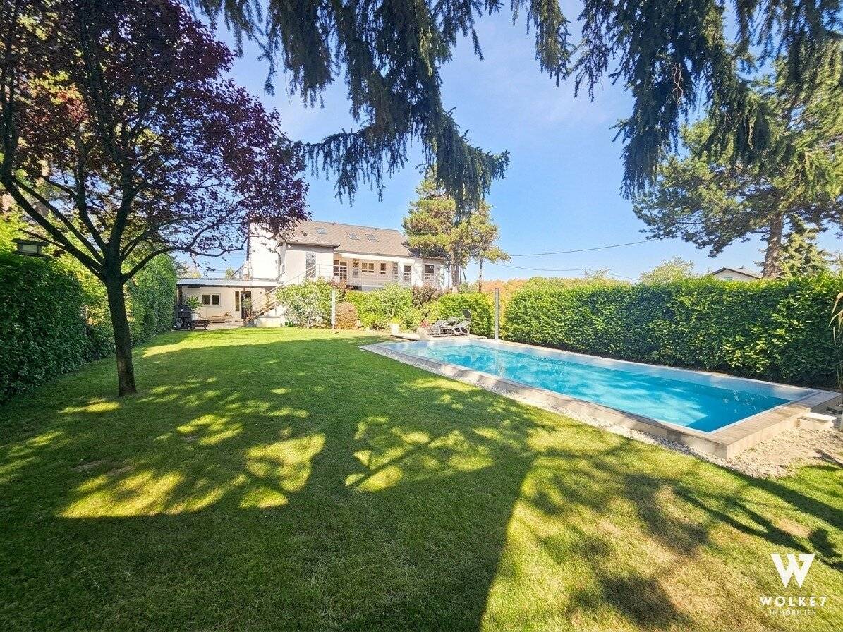 Wohnen mit Urlaubsfeeling – Familientraum mit ca. 252 m² Wohnfläche, Pool & großzügigem Garten | Klimaanlage | 3 Terrassen