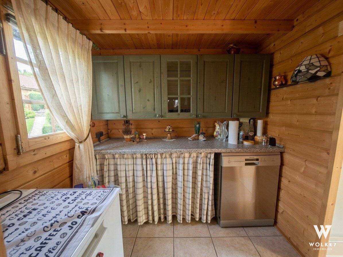 Ganzjährig wohnen oder Sommerhaus im Grünen – charmantes Kleingartenwohnhaus mit gepflegtem Garten in 1210 Wien in absoluter Ruhelage!