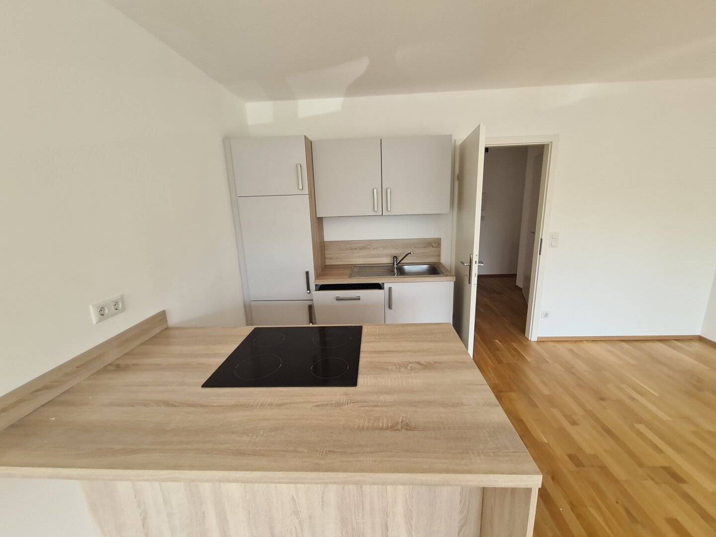 Top-Neubauwohnung mit Garage und Fußbodenheizung