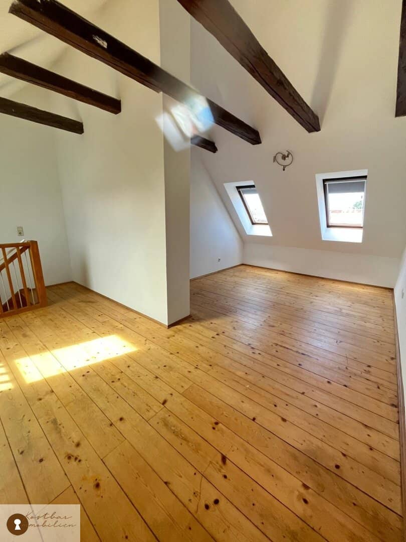 Highly original attic apartment with gallery at Griesplatz for sale