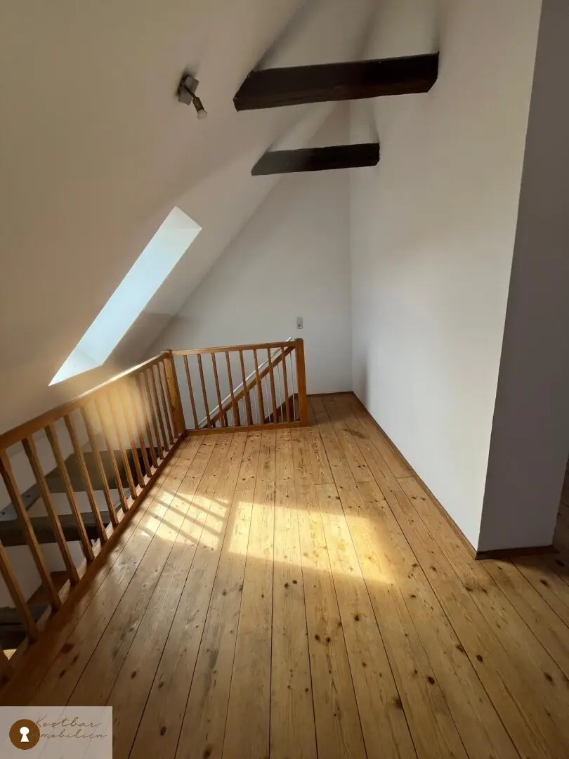 Highly original attic apartment with gallery at Griesplatz for sale