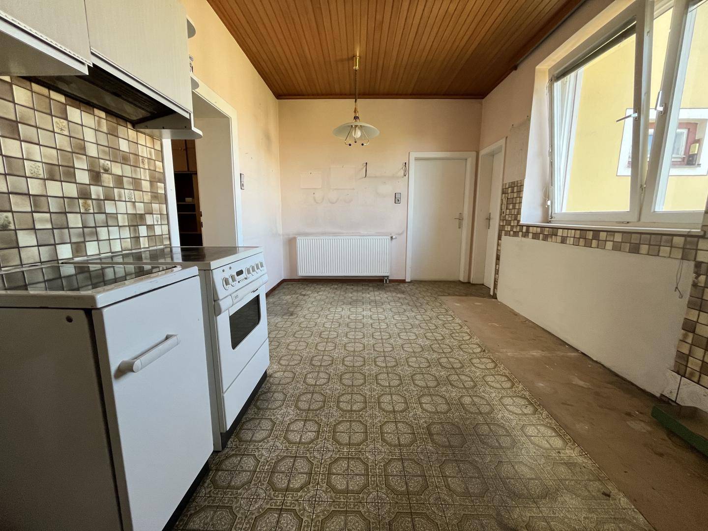 Well kept family apartment with garden and garage