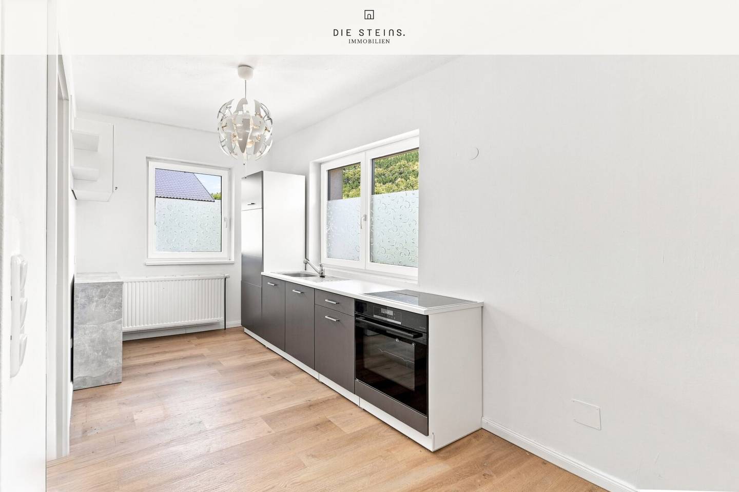 2-Zimmer-Wohnung mit Grünblick - Modernisiert, sofort bezugsbereit