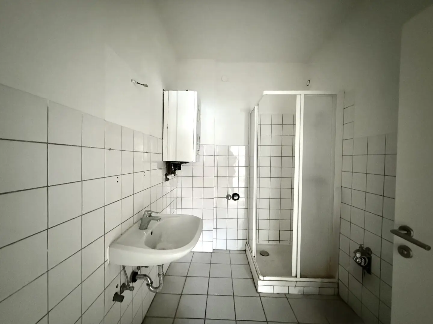 Sanierungsbedürftige 4-Zimmer-Wohnung inkl. Parkplatz