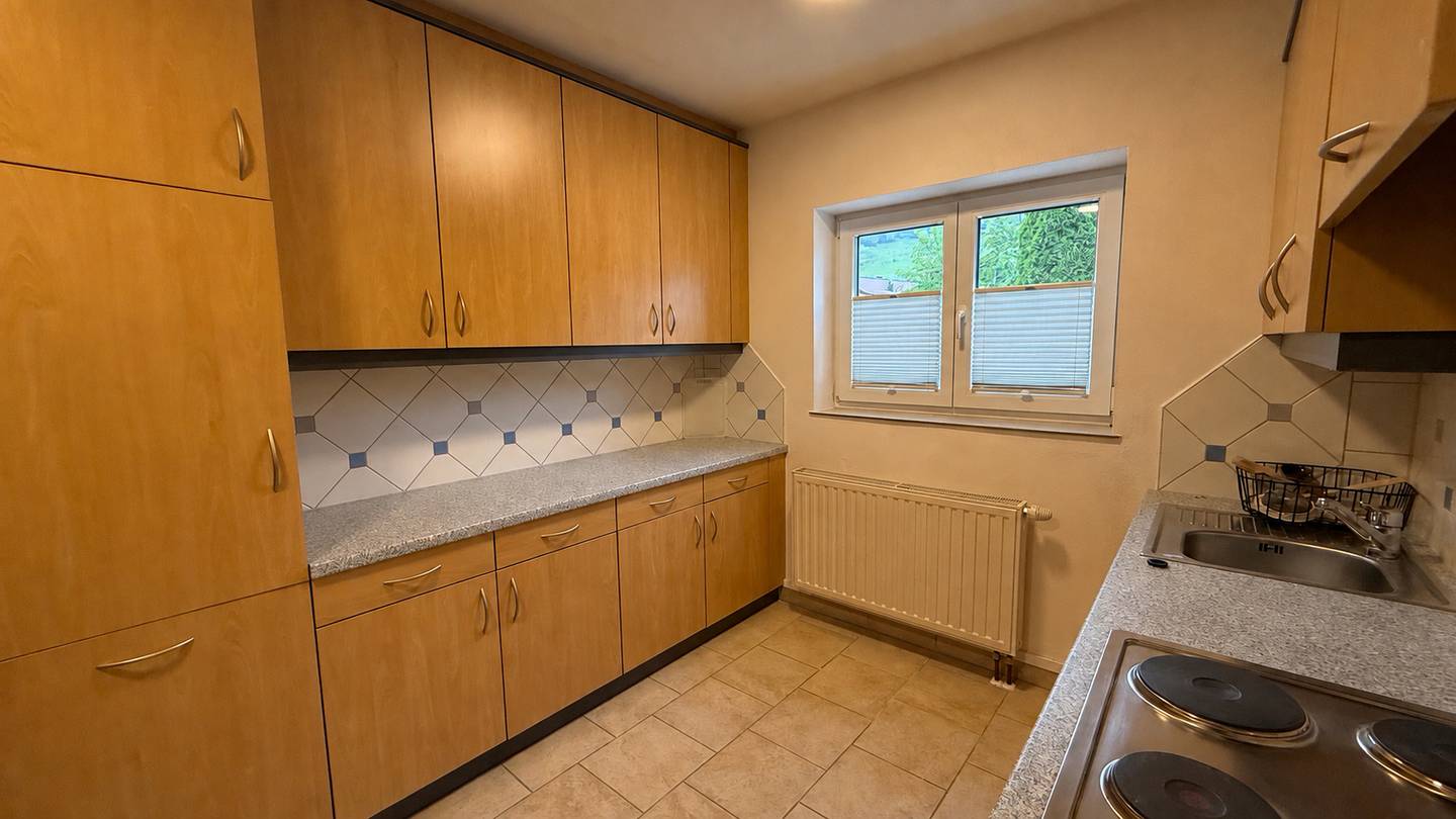 Erdgeschosswohnung with tiled stove in scenic mountain setting