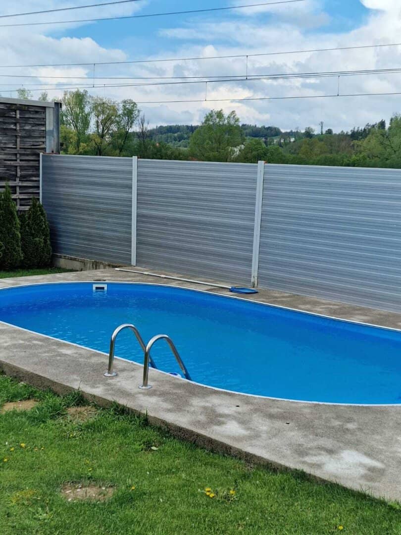 Fully renovated single or multi-family house with pool and additional green land