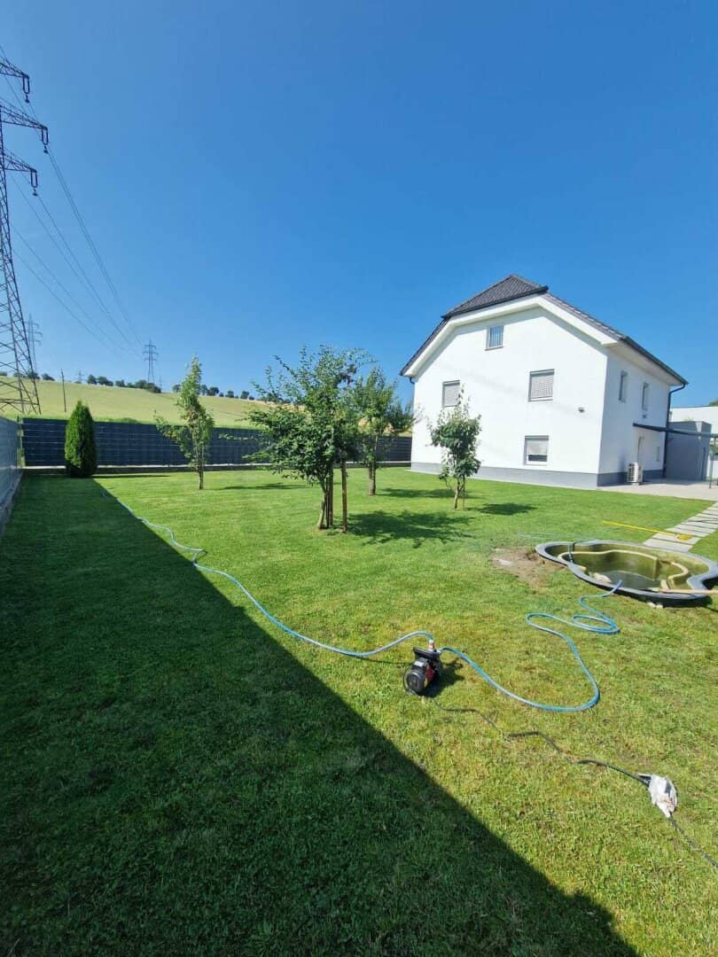 Fully renovated single or multi-family house with pool and additional green land