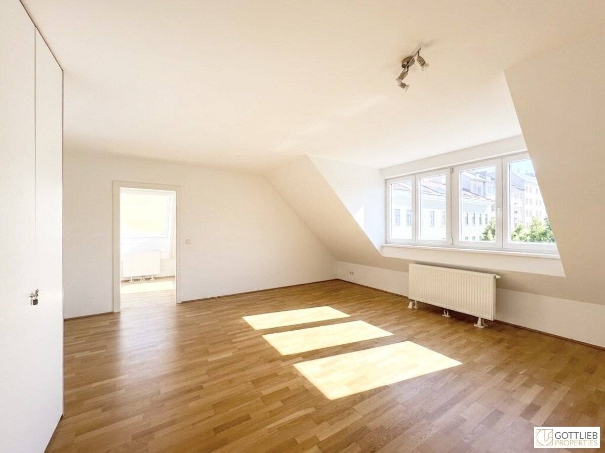 Grünruhelage nahe Raimundtheater! Lichtdurchflutete und barrierefreie 3-Zimmer-Dachgeschoss-Wohnung mit Parkblick