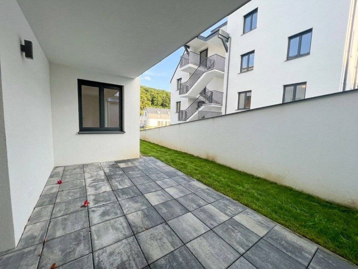 Garden apartment with 4 rooms 121.50 m2 living space 47.84 m2 garden and 2 terraces in Untermauerbach in absolute green quiet location