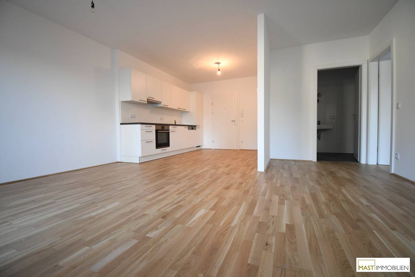 Top-floor in absolute quiet location - 2-room apartment including EWE fitted kitchen