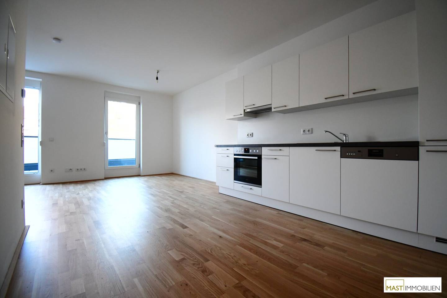 Top-floor in absolute quiet location - 2-room apartment including EWE fitted kitchen