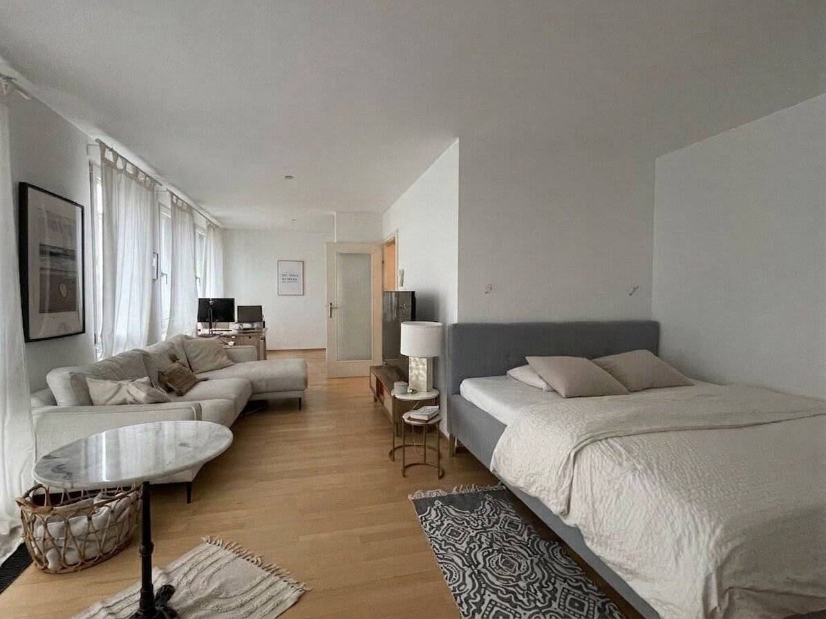 Single-Wohnung mit Schlafnische und Gemeinschaftsdachterrasse direkt beim Karlsplatz!